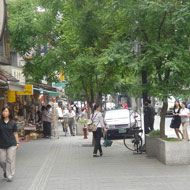Historic character of Insadong-gil is strengthened with custom street furnishings. Source: MIG