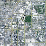 The Strip and the footbridges at the intersection of Las Vegas Blvd and Sands Ave  Source: Google Earth 2011 